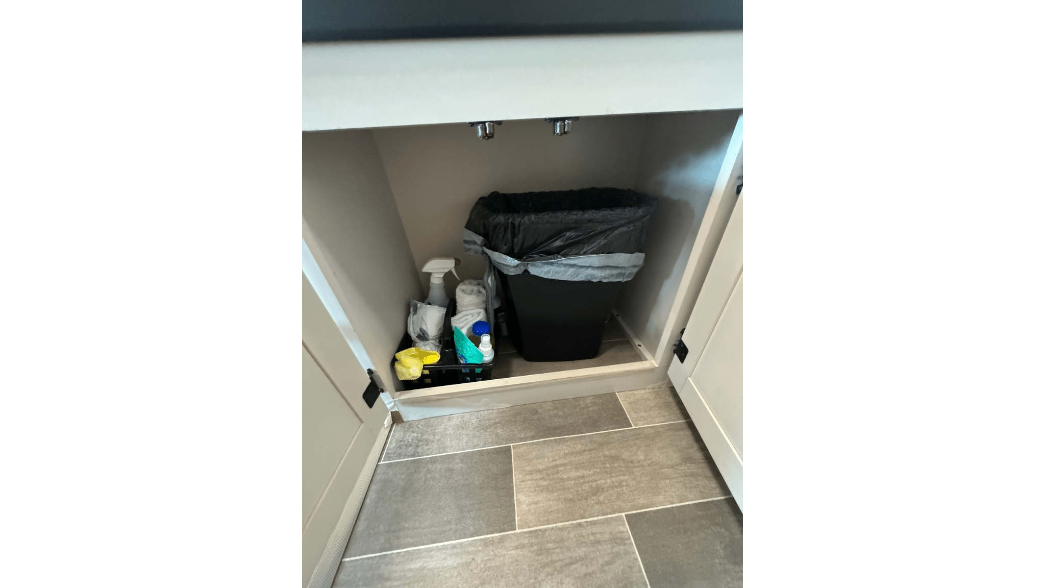 2022 Thor Chateau Roadrunner RV cleaning supplies with trashcan